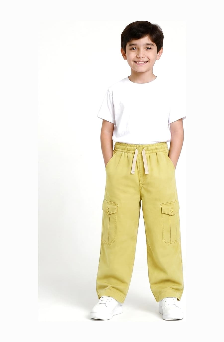 Kids' butter yellow cotton cargo trouser, worn by a child — The Kids Cargo Trouser, Pakistan