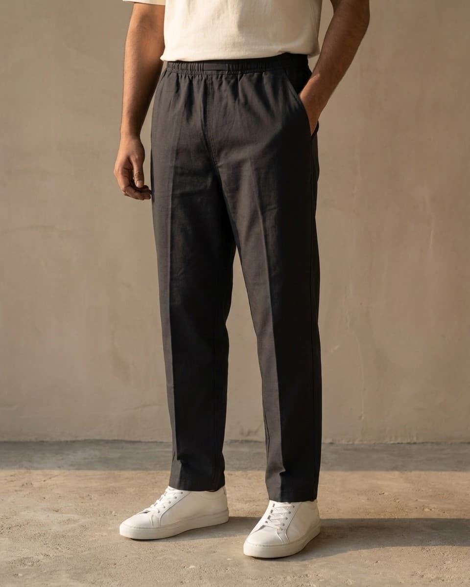 Desire Cotton — the Everyday Trouser in matte black cotton, full leg and elastic waistband